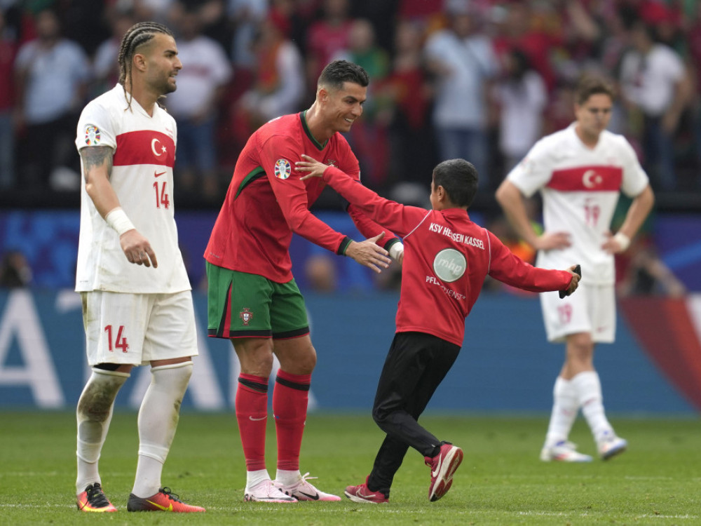 Kristijano Ronaldo sa mladim navijačem
