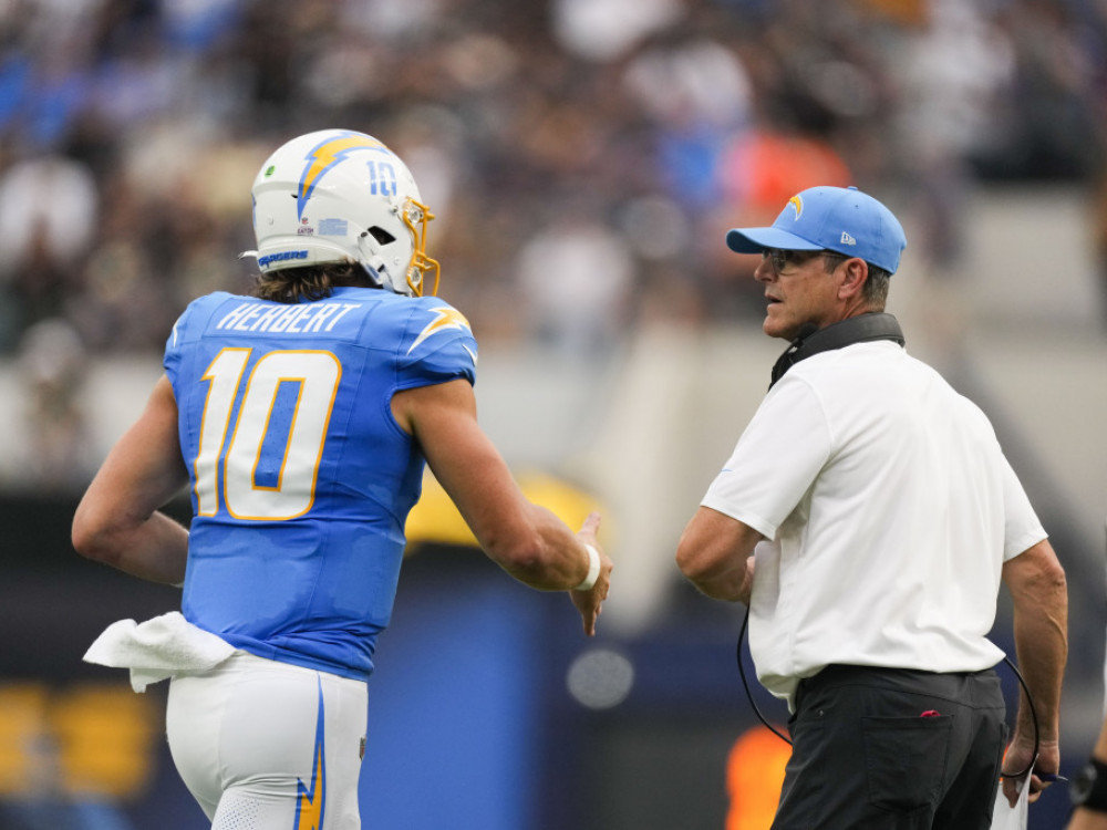 JUSTIN HERBERT AND JIM HARBAUGH/LOS ANGELES CHARGERS